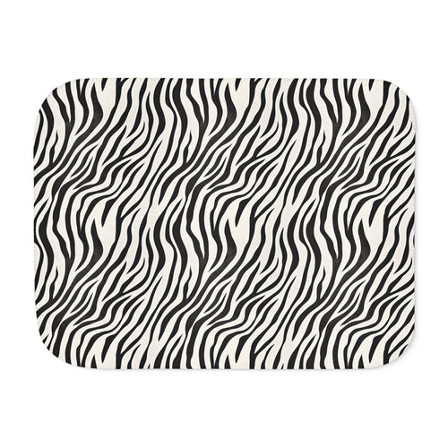 Black and white zebra print sherpa blanket laid flat, front view