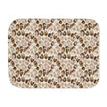 Brown leopard print sherpa blanket laid flat, showing open camel, tan and soft brown rosettes with a white sherpa edge