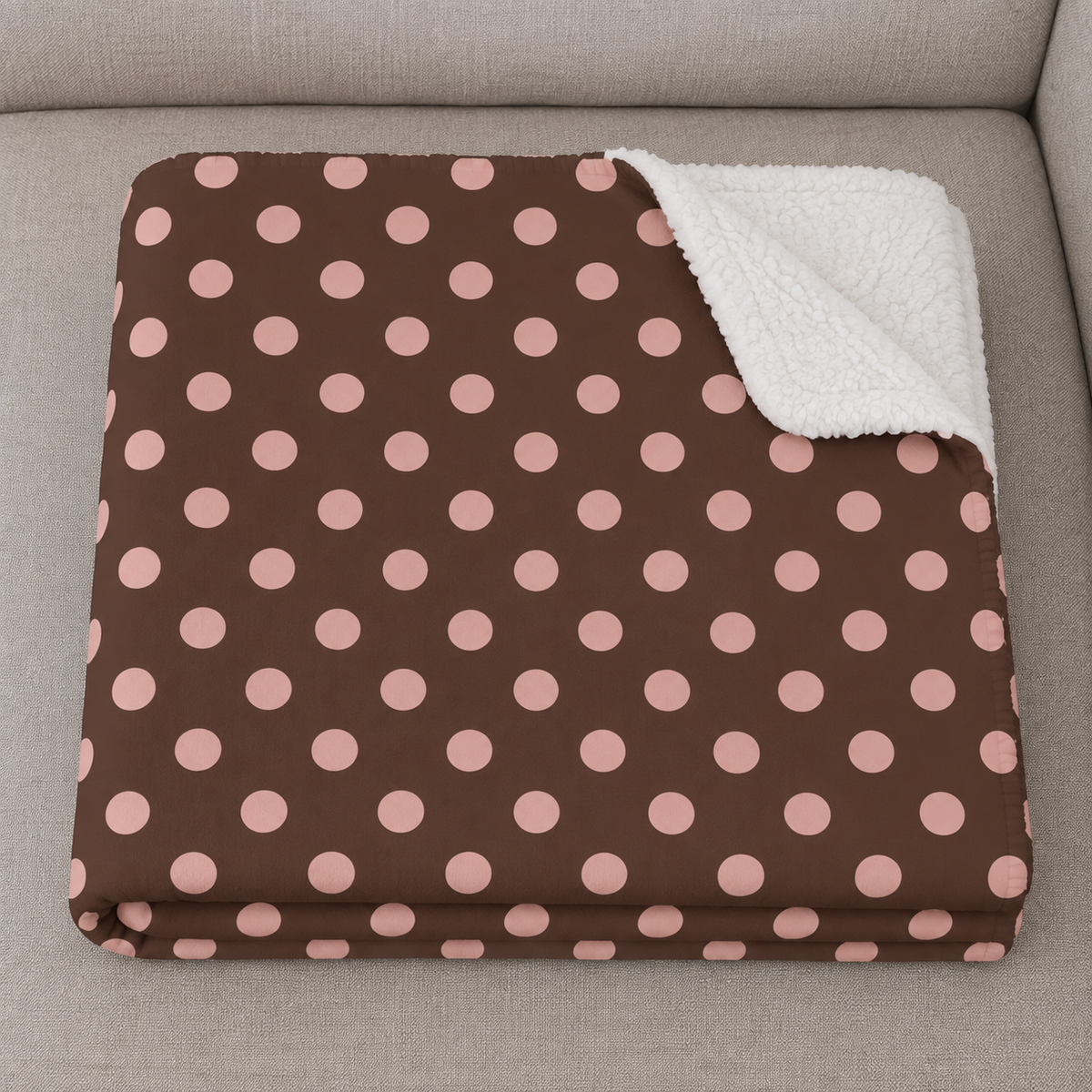 Close-up of the folded Brown Polka Dot Sherpa Blanket showing the sherpa back