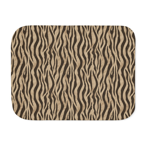 Brown tiger stripe sherpa blanket laid flat, showing deep brown stripes on a sand ground with a white sherpa edge