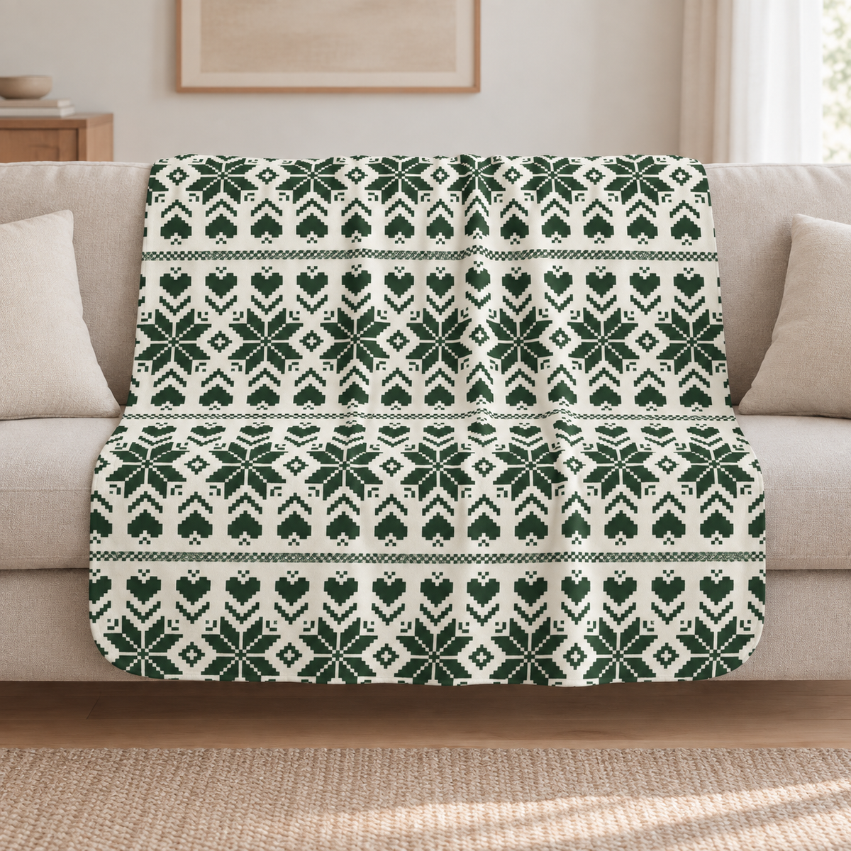 Green Nordic Star Christmas Sherpa Blanket draped over a cream sofa in a living room