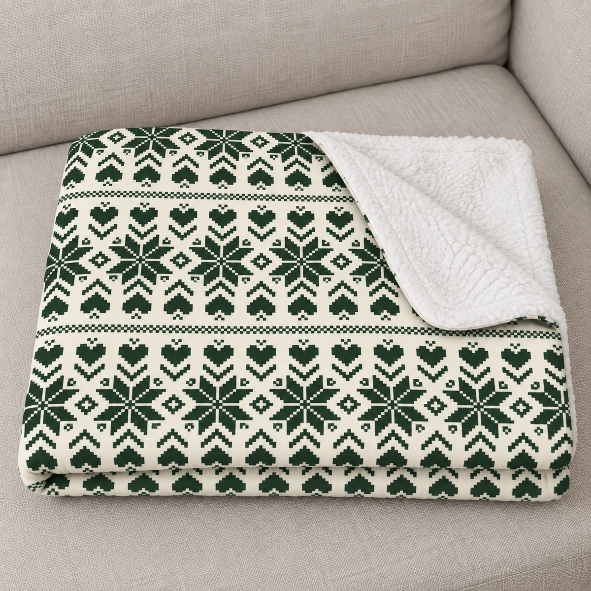 Close-up of the folded Green Nordic Star Christmas Sherpa Blanket showing the sherpa back