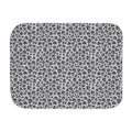 Grey leopard print sherpa blanket laid flat, showing open soft grey, charcoal and cream rosettes with a white sherpa edge