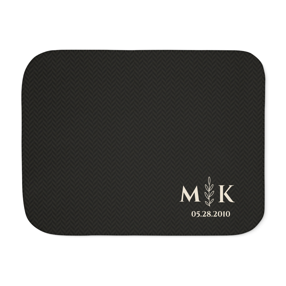 Personalized black sherpa blanket with monogram, front view with monogram