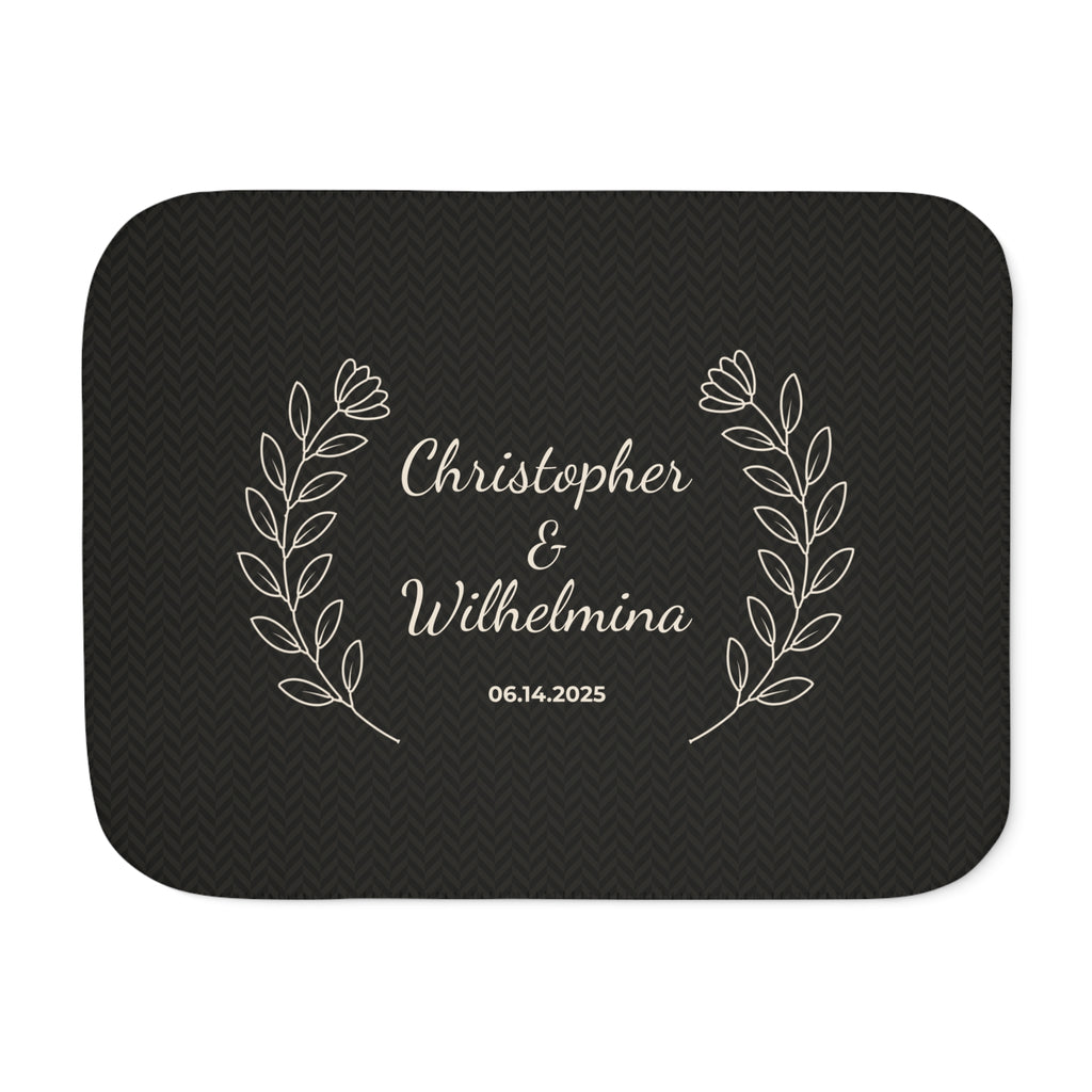 Personalized black sherpa blanket with two names and a date, front view with two names and a date