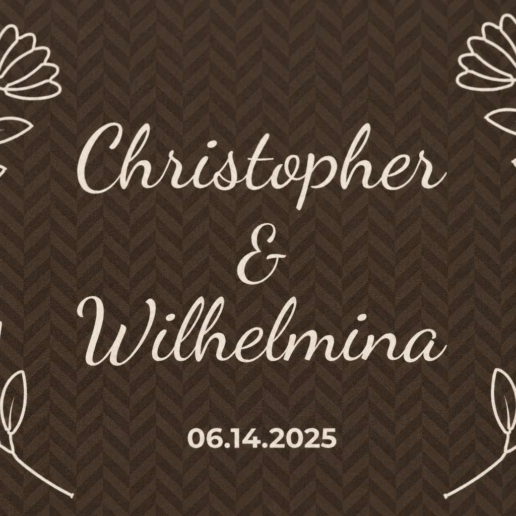 Personalized brown sherpa blanket with two names and a date, close-up of the two names and a date on the herringbone weave