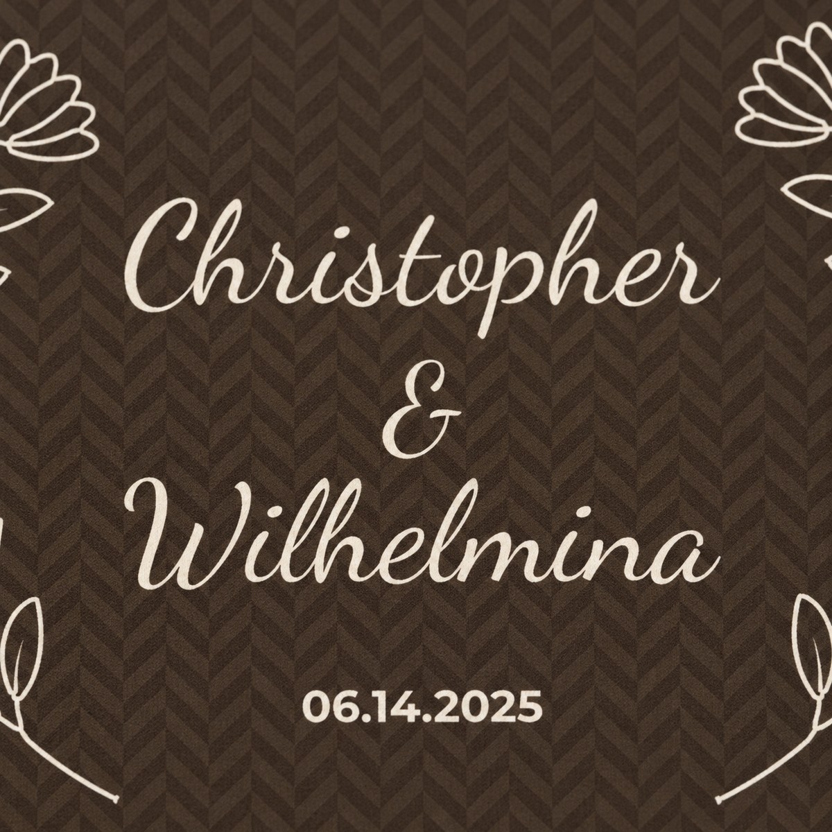 Personalized brown sherpa blanket with two names and a date, close-up of the two names and a date on the herringbone weave