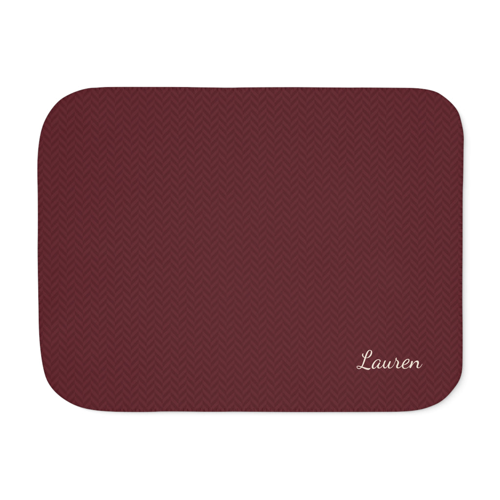 Personalized burgundy sherpa blanket with name, front view with name in the corner
