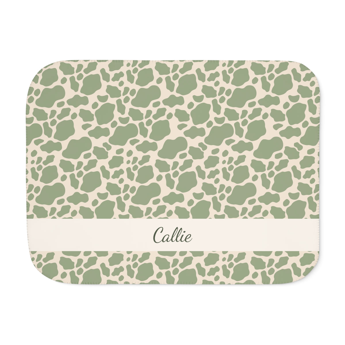 Personalized green cow print sherpa blanket with name, front view with name band