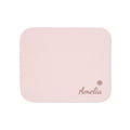 Personalized pink baby blanket with name and a flower, front view with name and flower