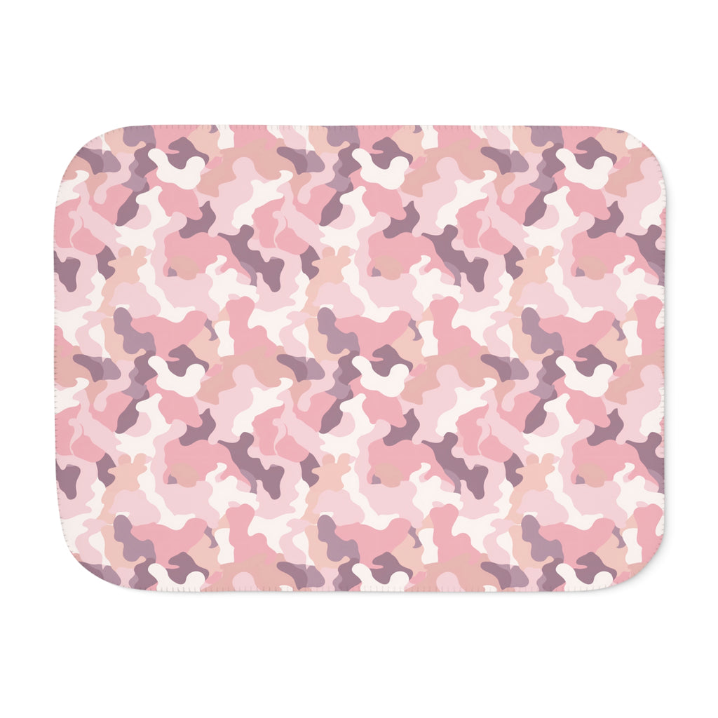 Pink camo sherpa blanket laid flat, showing the blush, rose and cream camouflage print with a white sherpa edge