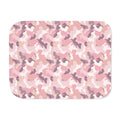 Pink camo sherpa blanket laid flat, showing the blush, rose and cream camouflage print with a white sherpa edge