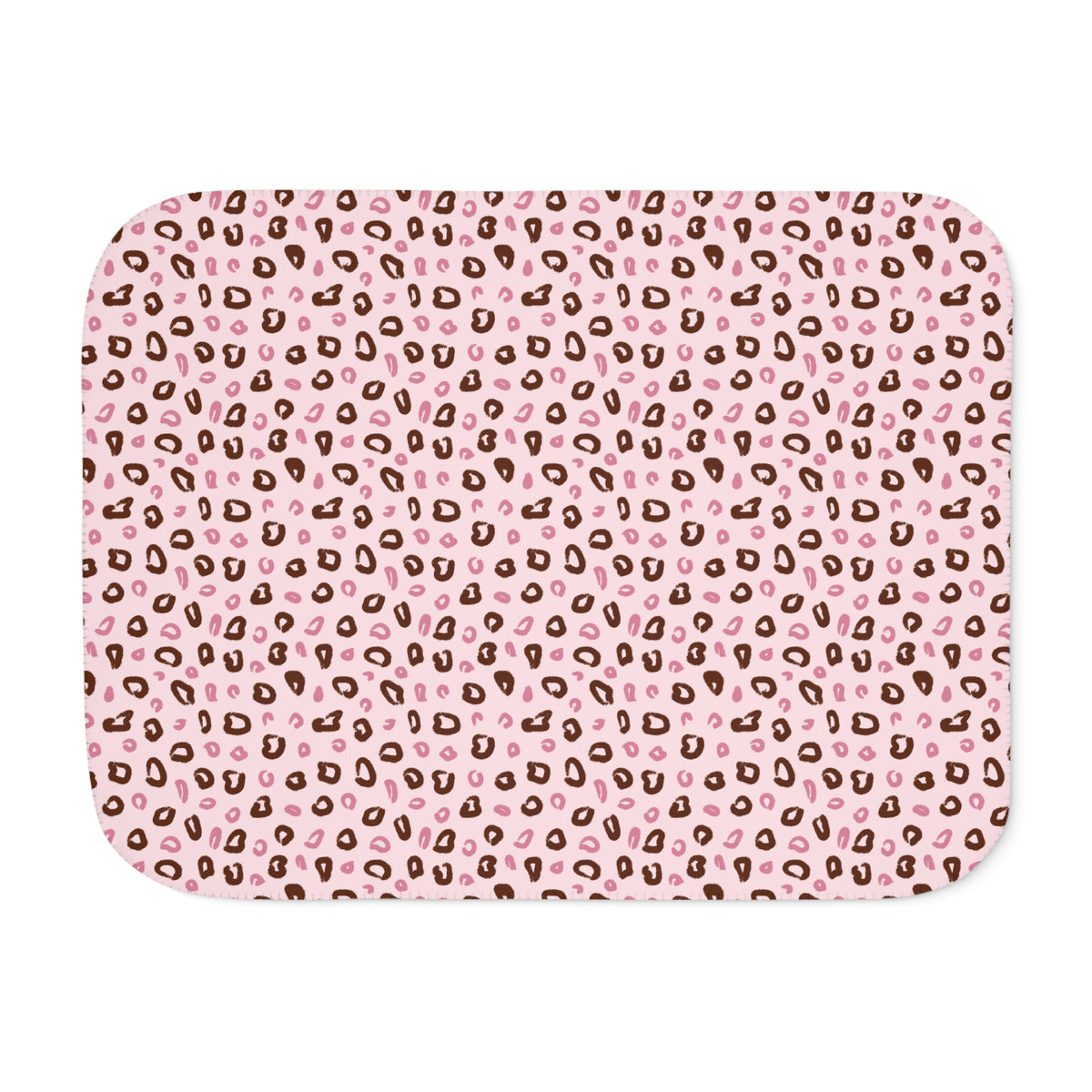 Pink leopard print sherpa blanket laid flat, showing open blush and dusty rose rosettes with a white sherpa edge