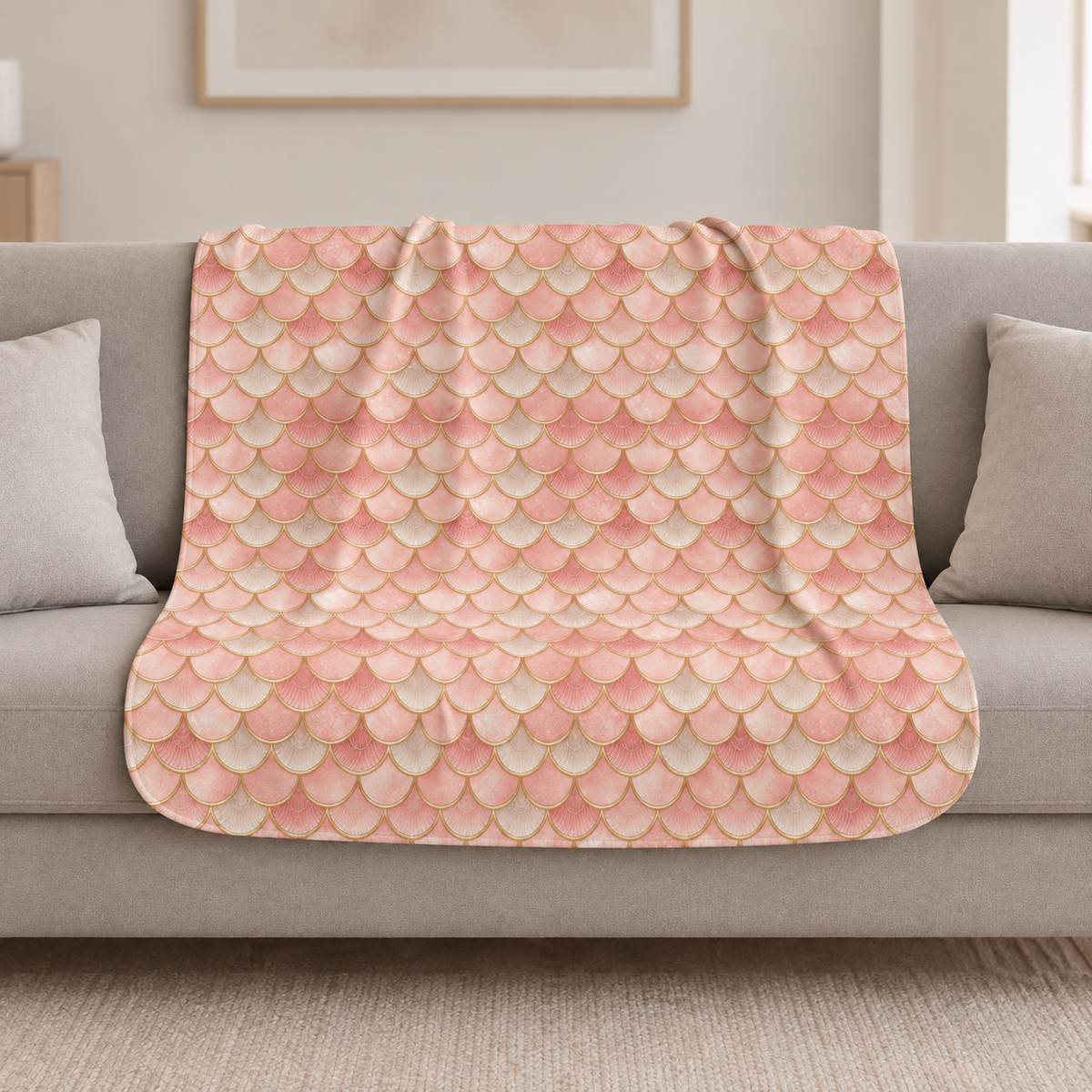 Pink Mermaid Scale Sherpa Blanket draped over a cream sofa in a living room