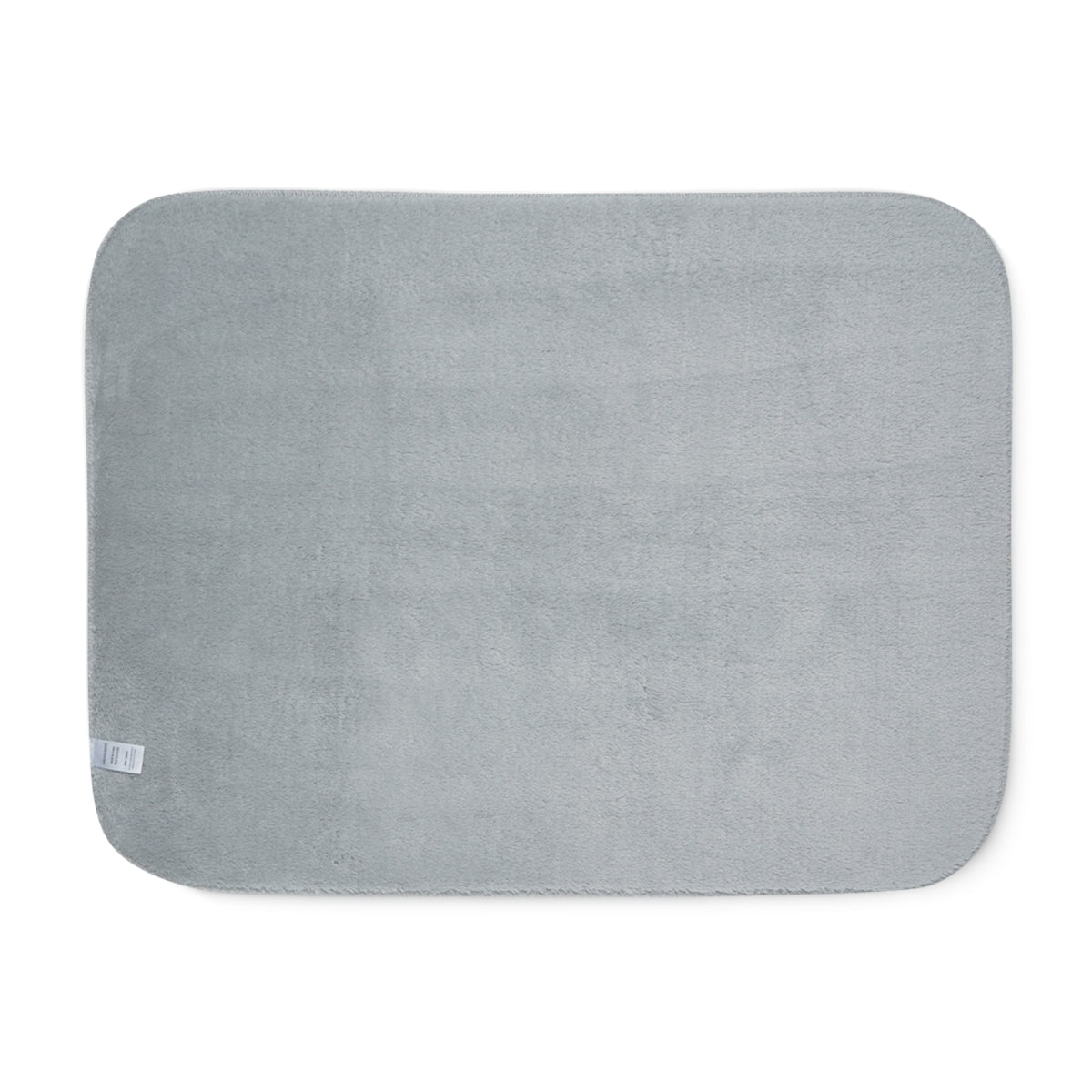 Back of the Pink Mermaid Scale Sherpa Blanket in grey sherpa